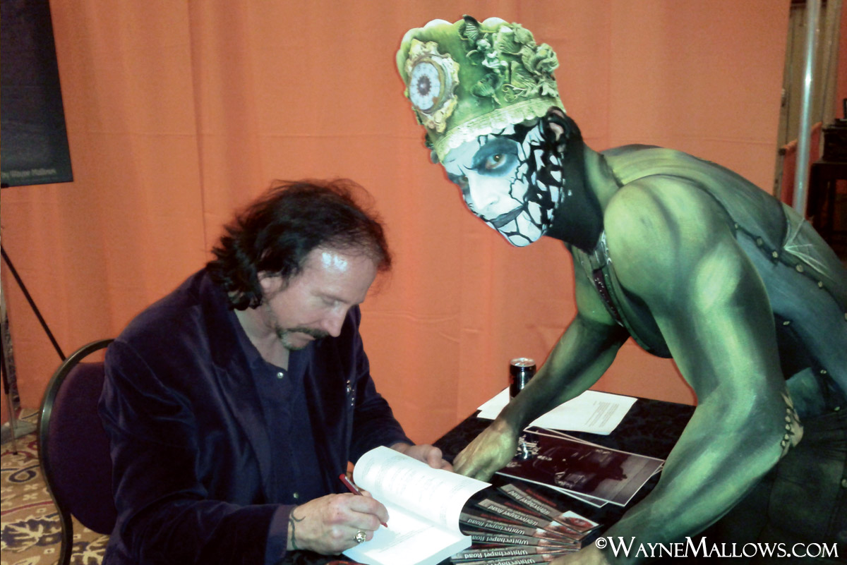 Book signing at an event. Amazing body paint!